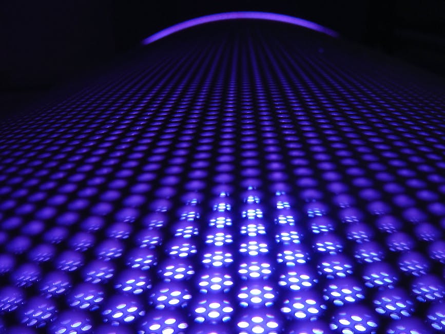 A captivating abstract image featuring glowing purple spheres in a dynamic pattern.